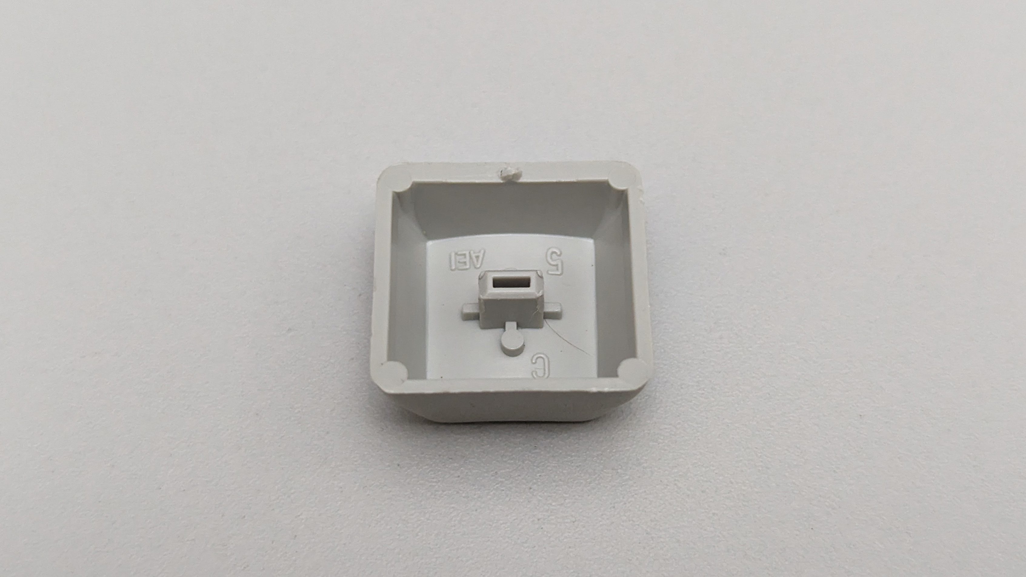 1990_apple_m0116_-_keycap1.jpg